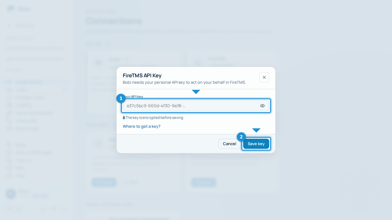 The FireTMS API key dialog in Bobi with a key field and a „Save key” button